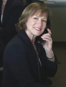 Kathy answering a phone
